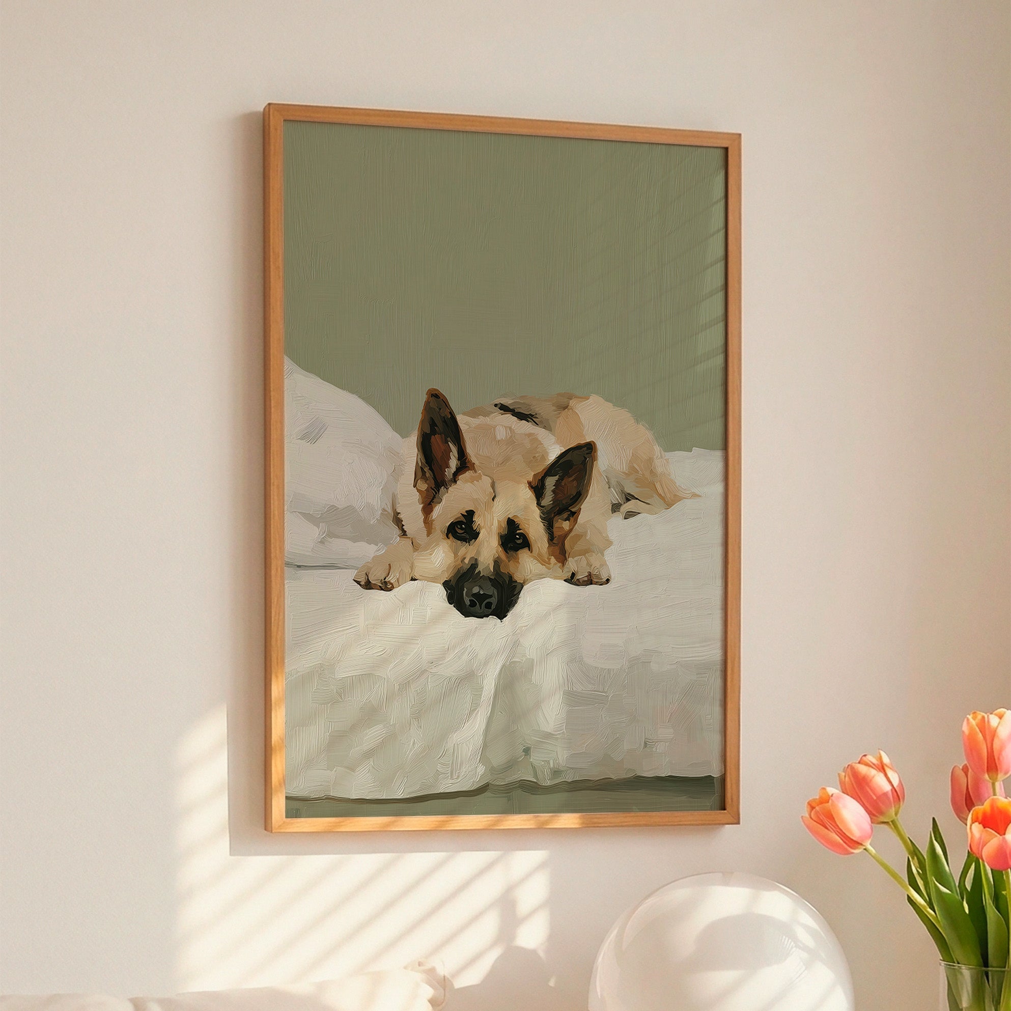 A contemporary oil-style art print of a German Shepherd lying on white bedding with alert ears, painted in warm honey tones against a soft sage green background.