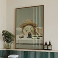 Bathroom with a bathtub, towels, and a framed picture of a dog on the wall.