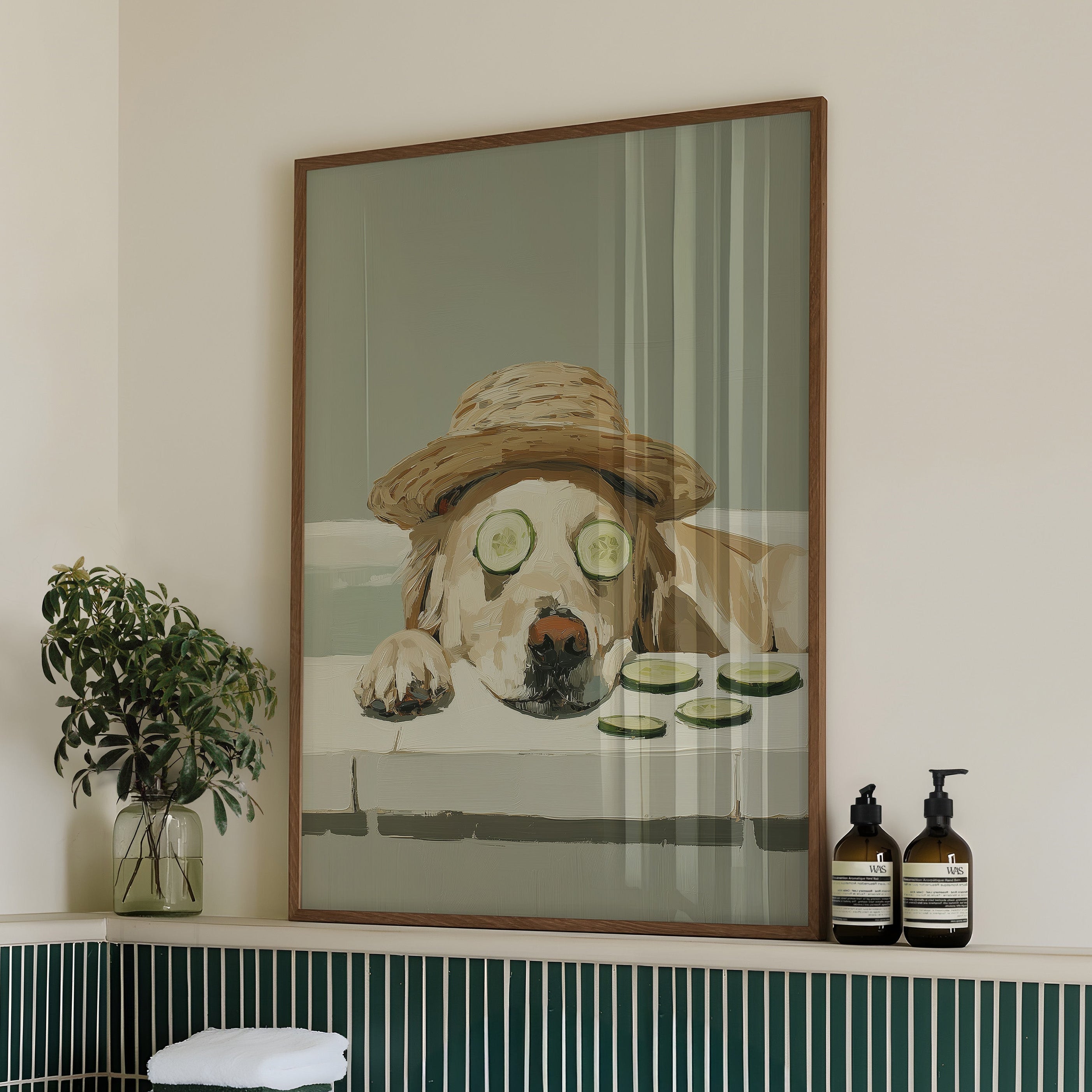 Bathroom with a bathtub, towels, and a framed picture of a dog on the wall.