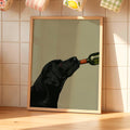 A contemporary oil-style art print of a black Labrador drinking from a wine bottle, painted in deep glossy black tones against a soft sage green background with expressive brushwork.